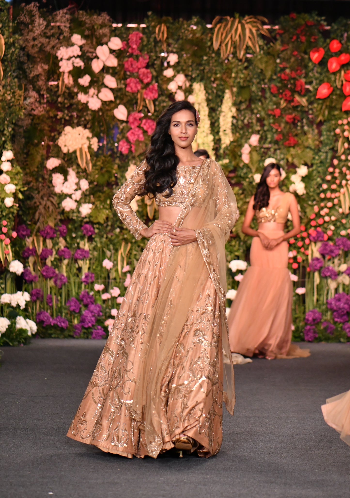 Full sleeve embellished gold lehenga