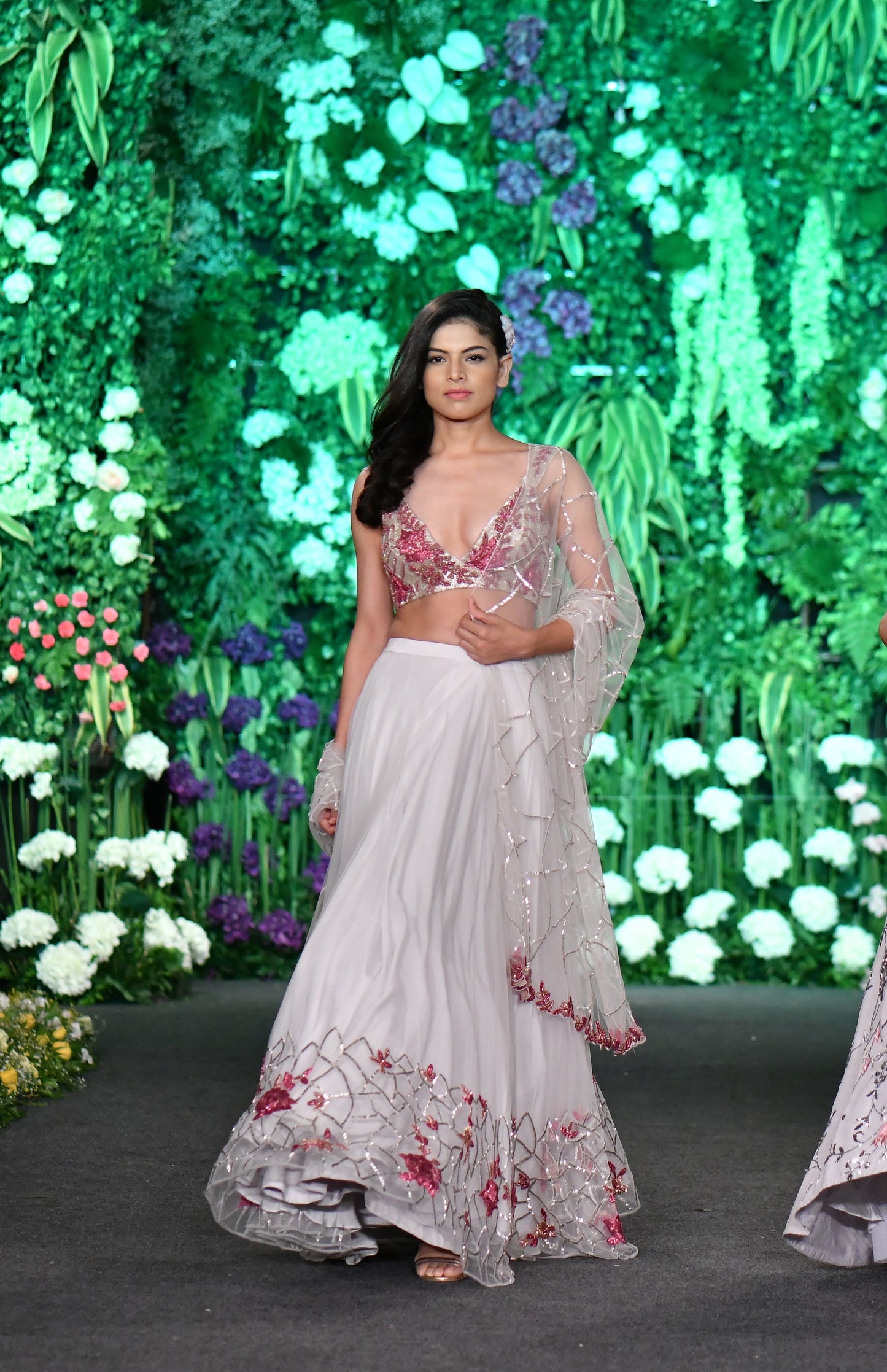 Deep neck rose embellished white lehenga