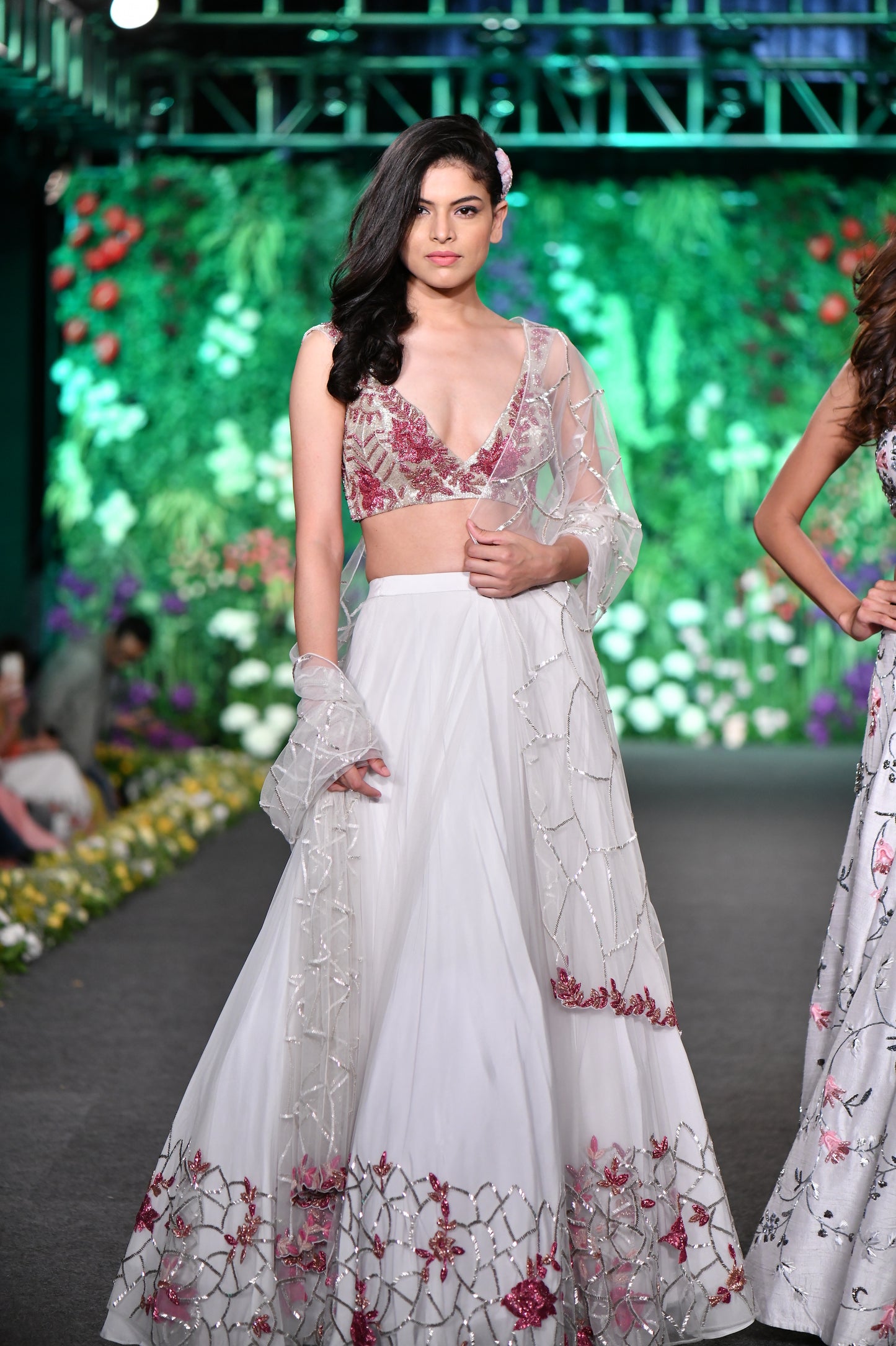 Deep neck rose embellished white lehenga